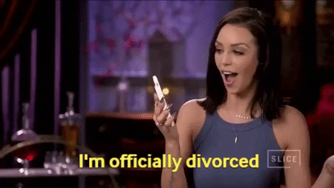 Gif of a woman looking at her phone then saying I'm officially divorced